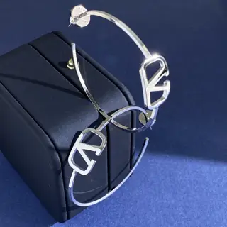 Valentino glossy V letter circle C shape earrings