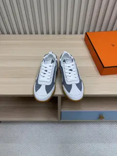 Hermès casual sneakers Suede goatskin sneakers decorated with contrasting patterns and
