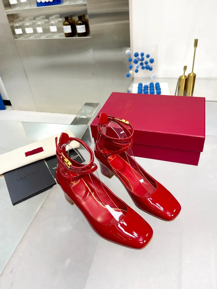 Valentino’s new patent leather version of the classic V-buckle sandals. New and upgraded
