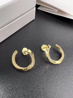 celine twisted half diamond earrings