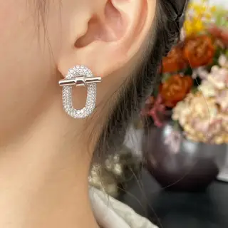 V gold material Hermès oval OT earrings