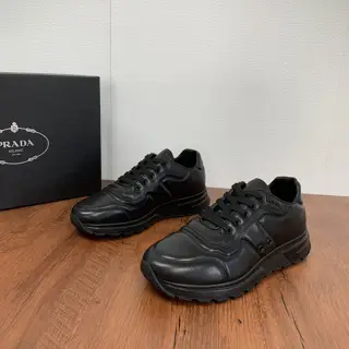 Prada lace-up leather sneakers