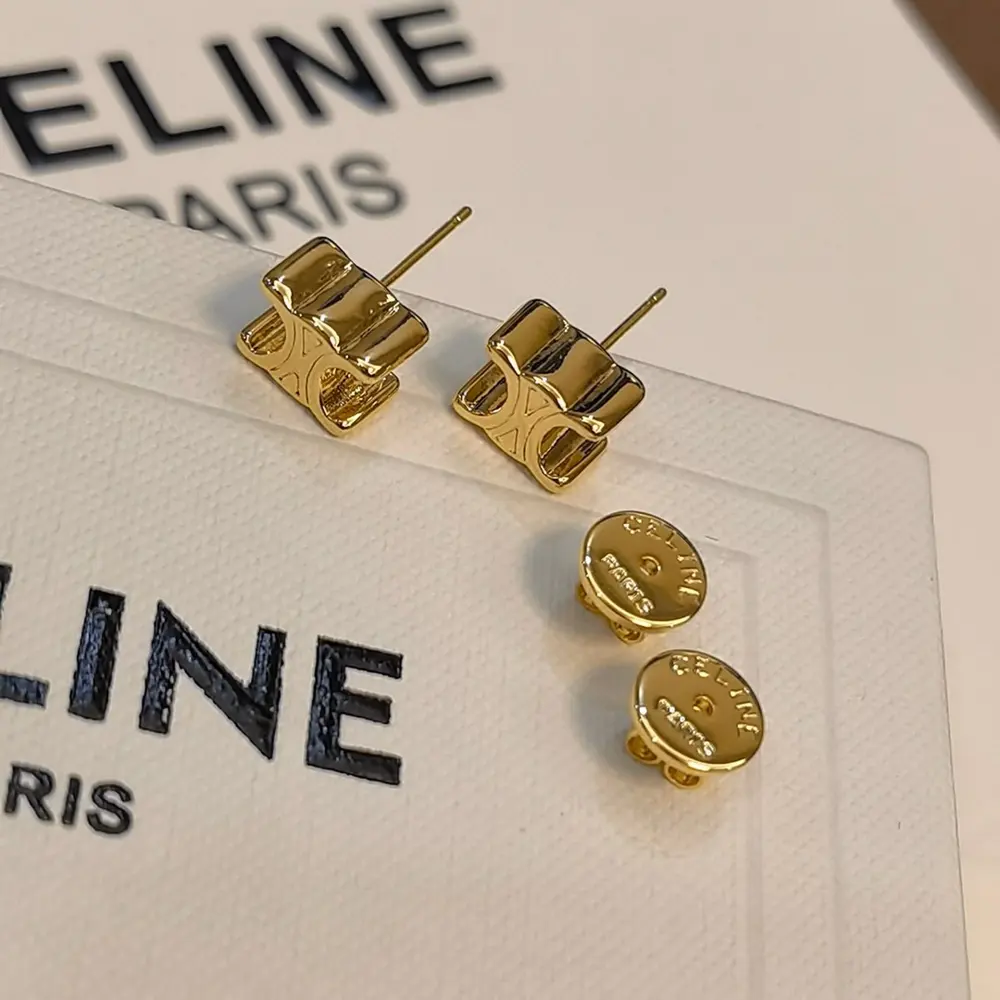 Celine Arc de Triomphe carved letter earrings