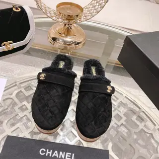 Chanel’s popular all-leather slippers
