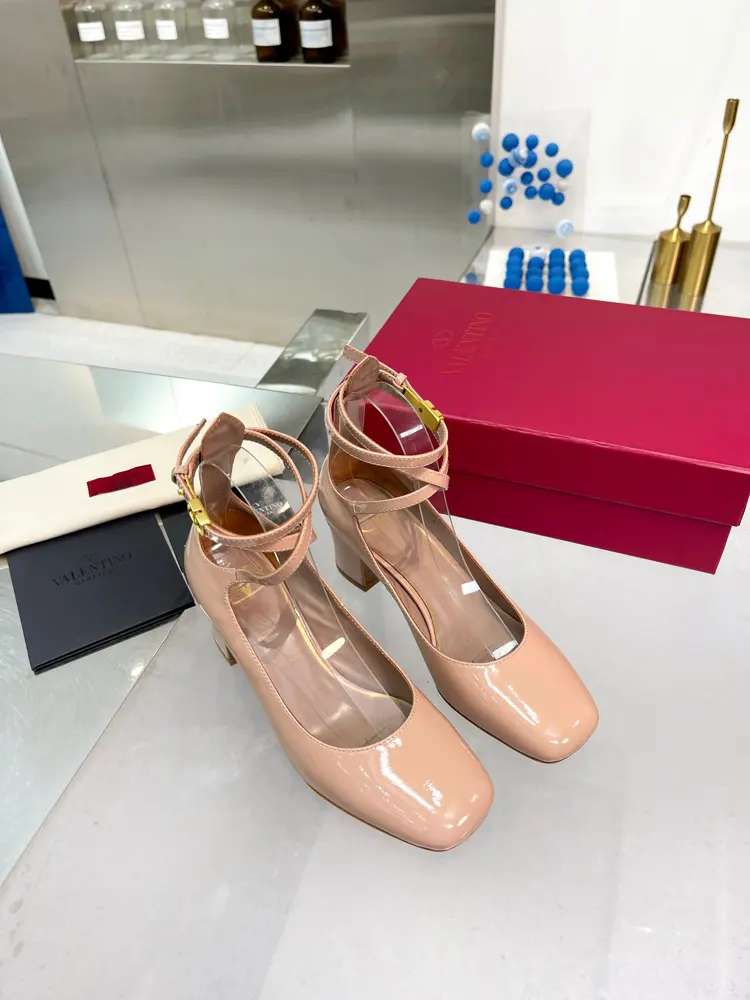 Valentino’s new patent leather version of the classic V-buckle sandals. New and upgraded