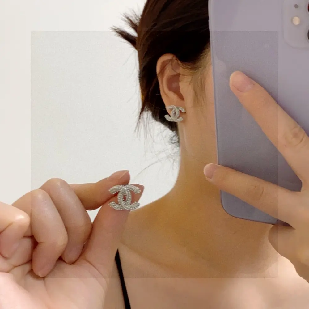 Chanel silver stud earrings with small pearls very casual and high-end highest version on