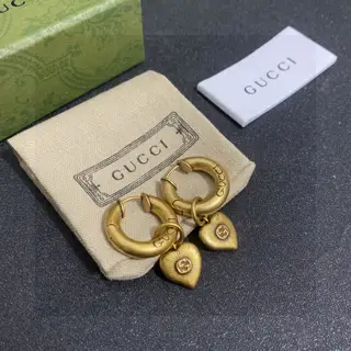 Gucci antique gold double “G” letter earrings