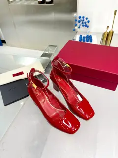Valentino’s new patent leather version of the classic V-buckle sandals. New and upgraded