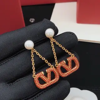 Valentino earrings with tassels and red diamonds