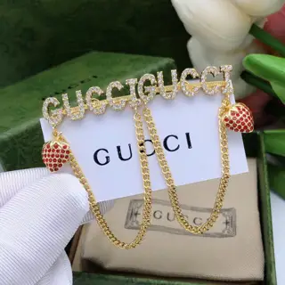 Gucci strawberry tassel earrings