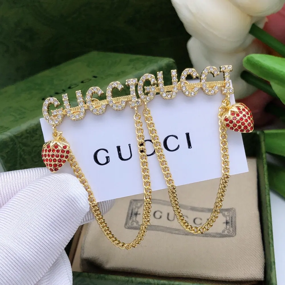 Gucci strawberry tassel earrings