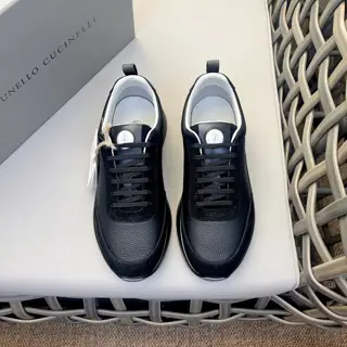 Brunello Cucinelli color-blocked sports flats for men. This pair of flat sports shoes