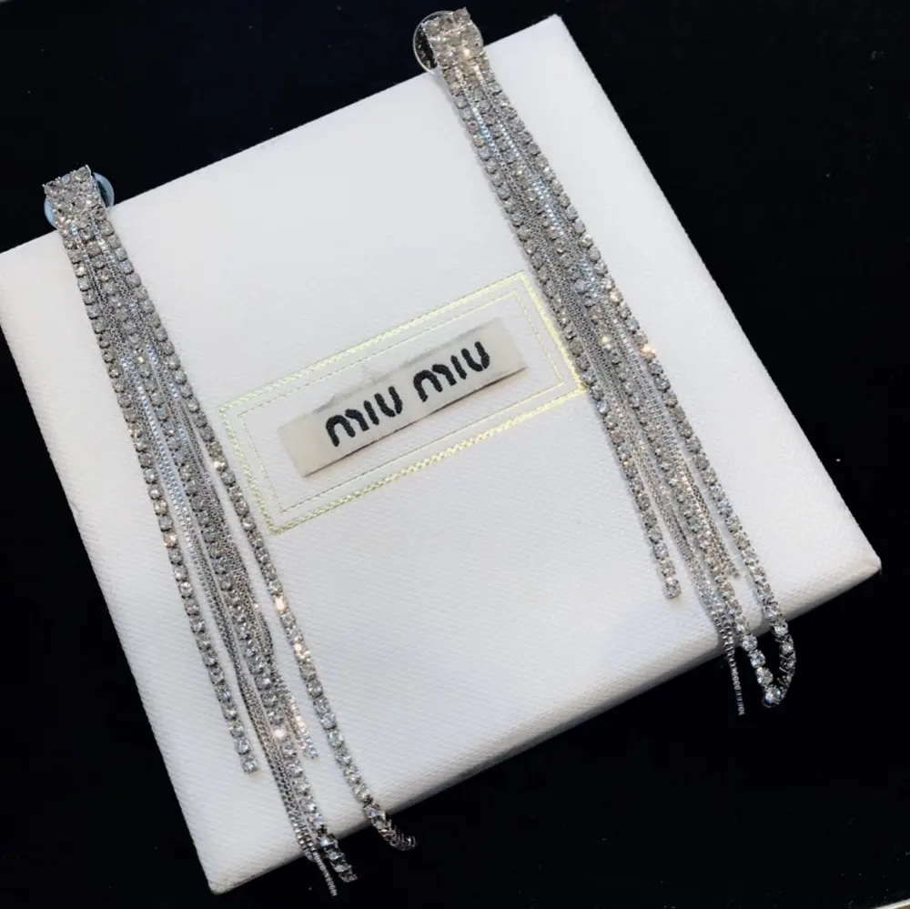 Celine crystal white diamond tassel earrings