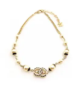 Chanel black pattern white cc necklace