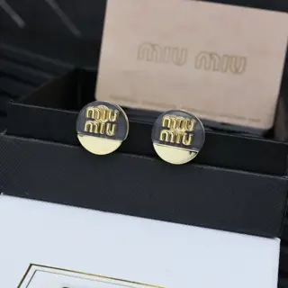 miumiu acrylic gold earrings