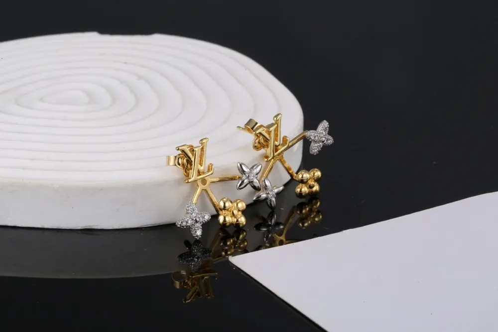 Louis Vuitton letter earrings