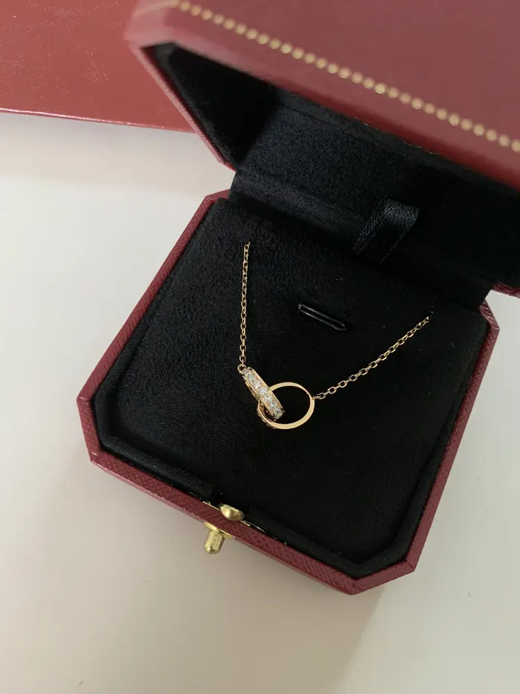 Cartier double ring necklace with diamonds