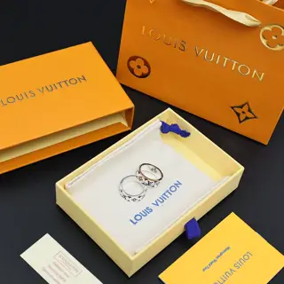 Louis Vuitton silver logo print ring
