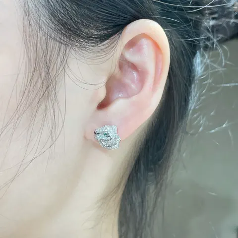 Cartier panther head earrings