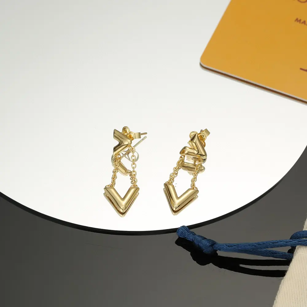 Louis Vuitton letter earrings