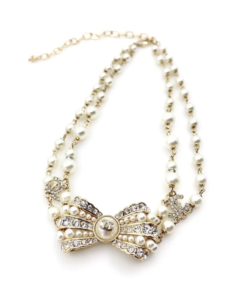 Chanel bow pearl necklace