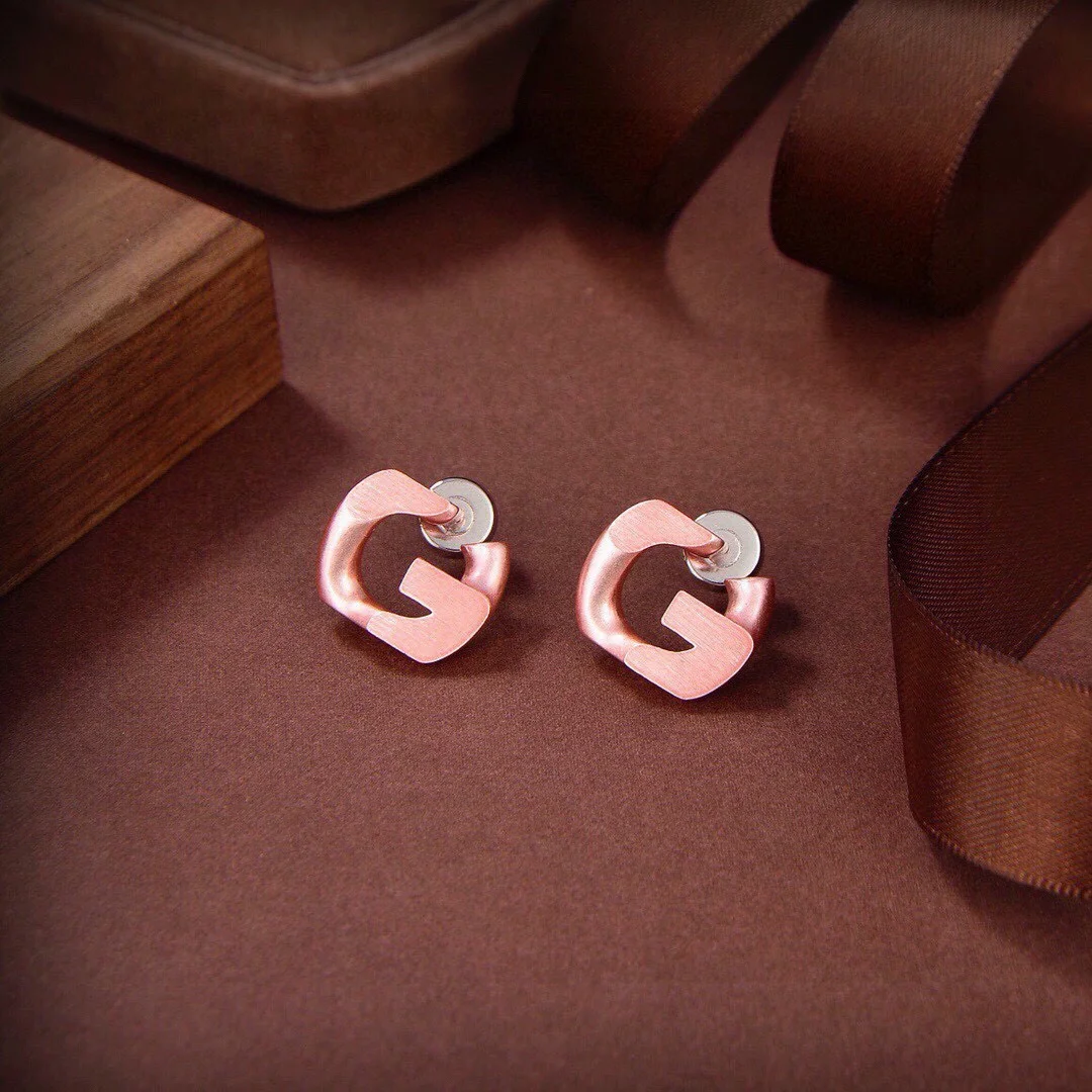 Givenchy G letter color matching earrings. I love the infinity symbol