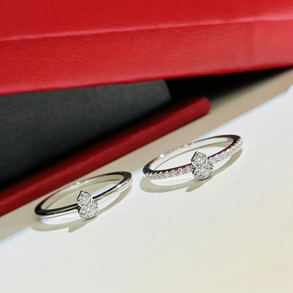 Qeelin double gourd ring set symbolizes companionship and snuggling together