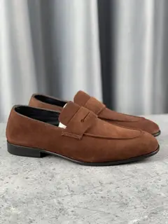 Zegna Loafers L’Asola’s tailored buttonhole details are inspired by Zegna suits. This pair