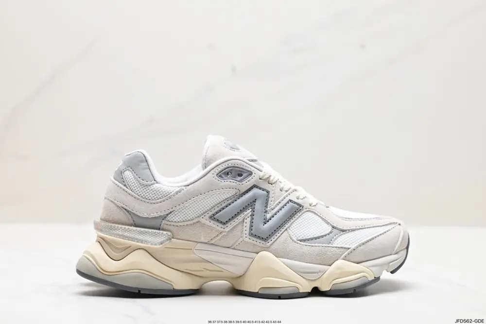 The New Balance 9060 shoe is inspired by the designer’s nostalgic memories of summer. The U9060GRY