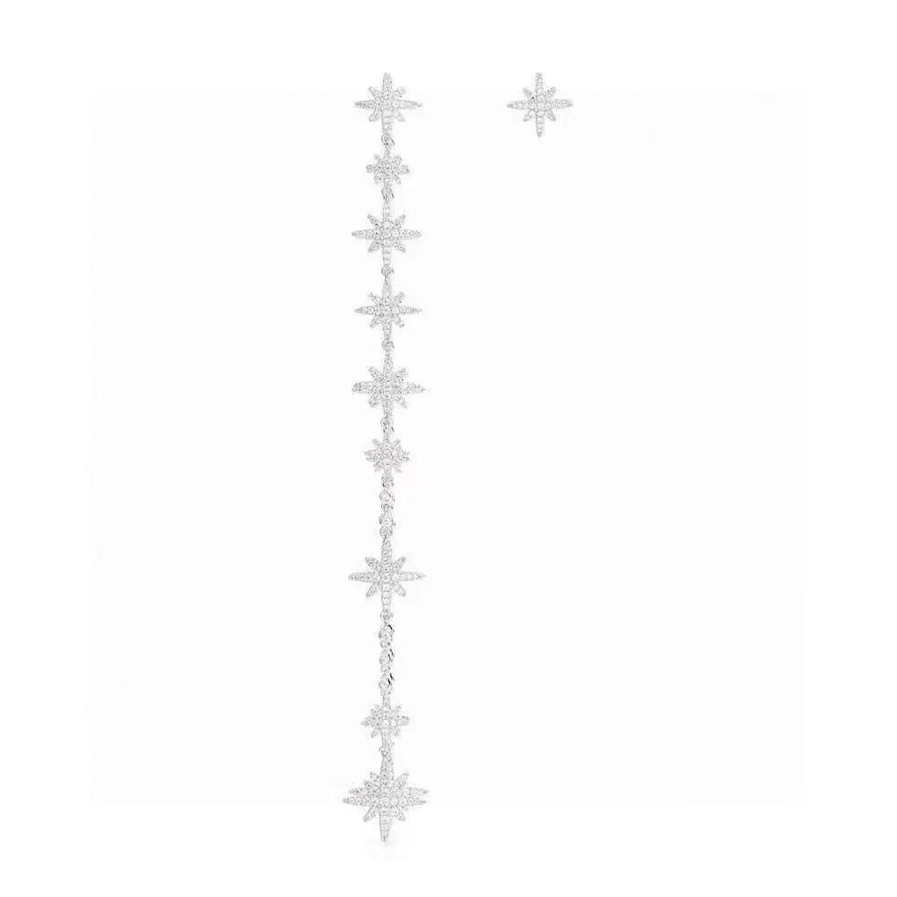APM Monaco asymmetrical long star-shaped earrings