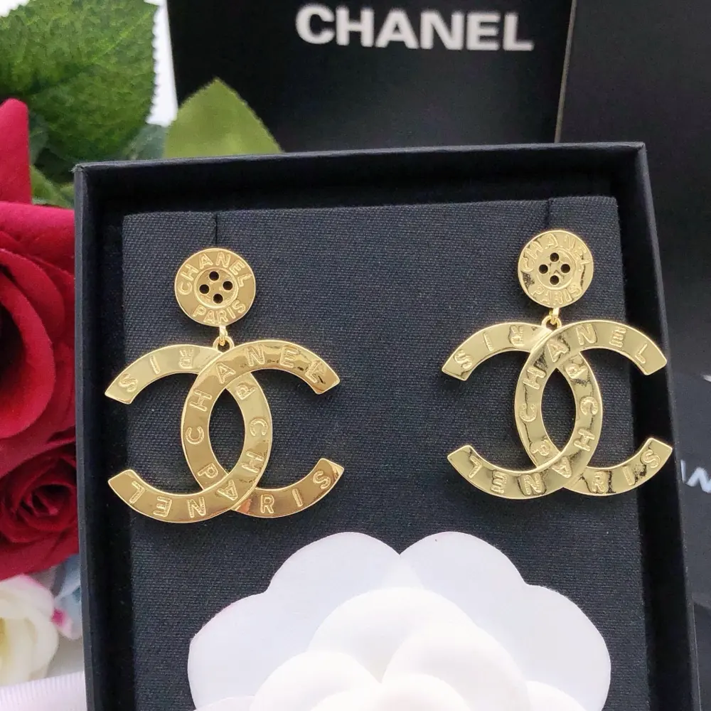 Chanel small button double c earrings