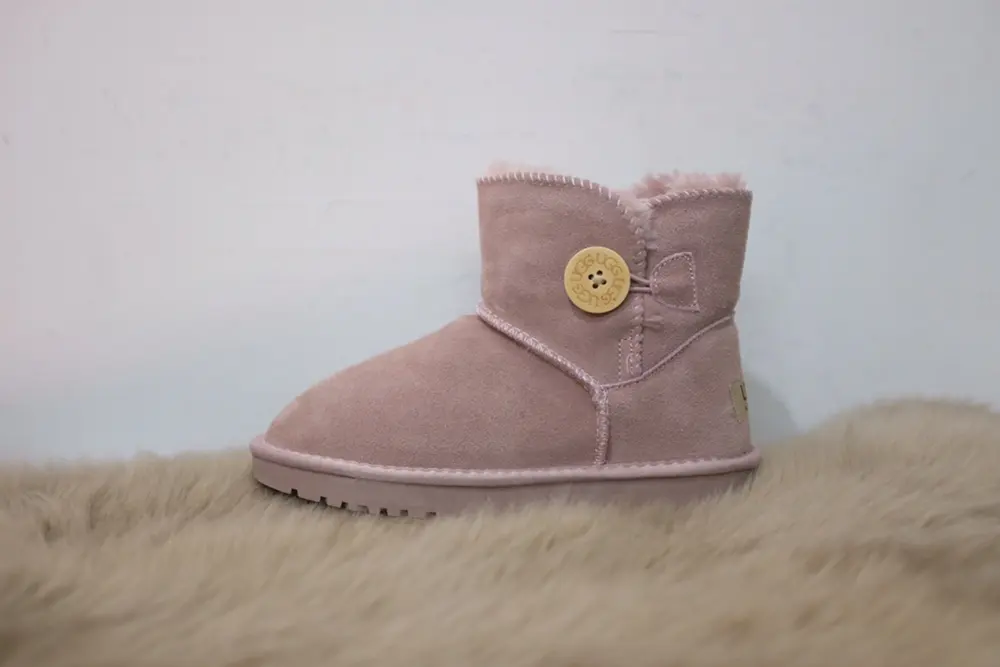 UGG mahogany buckle children’s snow boots