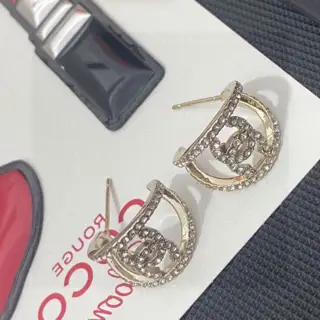 Chanel hollow Swarovski crystal diamond letter earrings