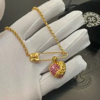 Chrome Hearts classic gold necklace with heart-shaped vine flower pin pendant