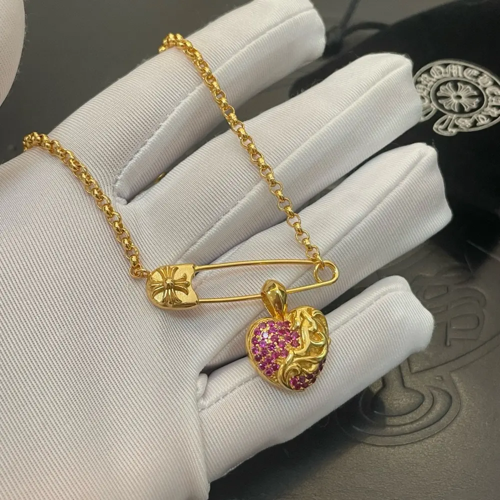 Chrome Hearts classic gold necklace with heart-shaped vine flower pin pendant