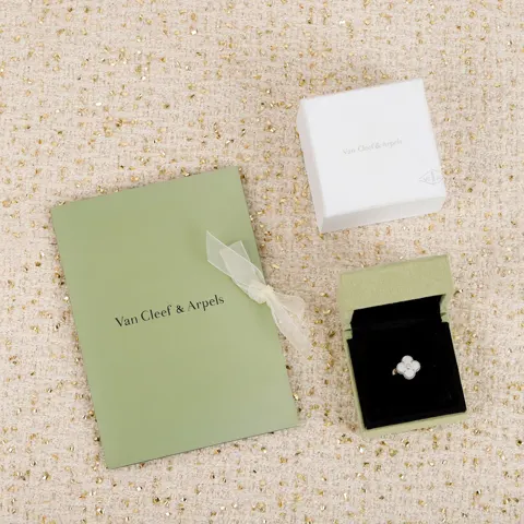Van Cleef & Arpels four-leaf clover ring with diamonds