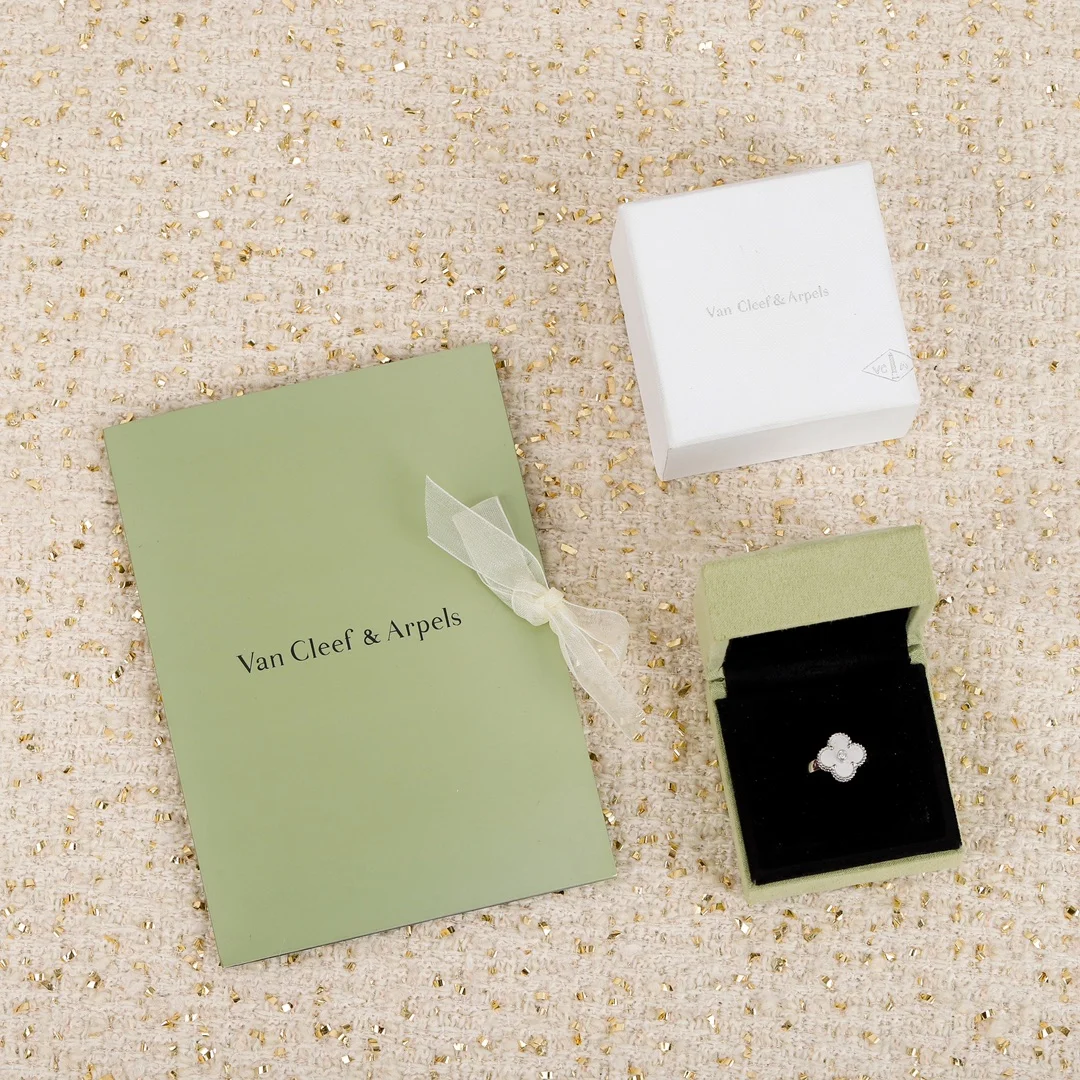 Van Cleef & Arpels four-leaf clover ring with diamonds