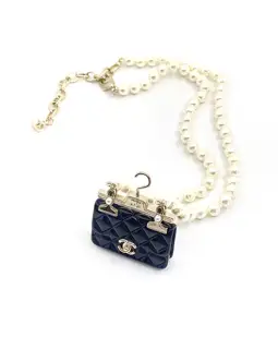 Chanel black bag necklace