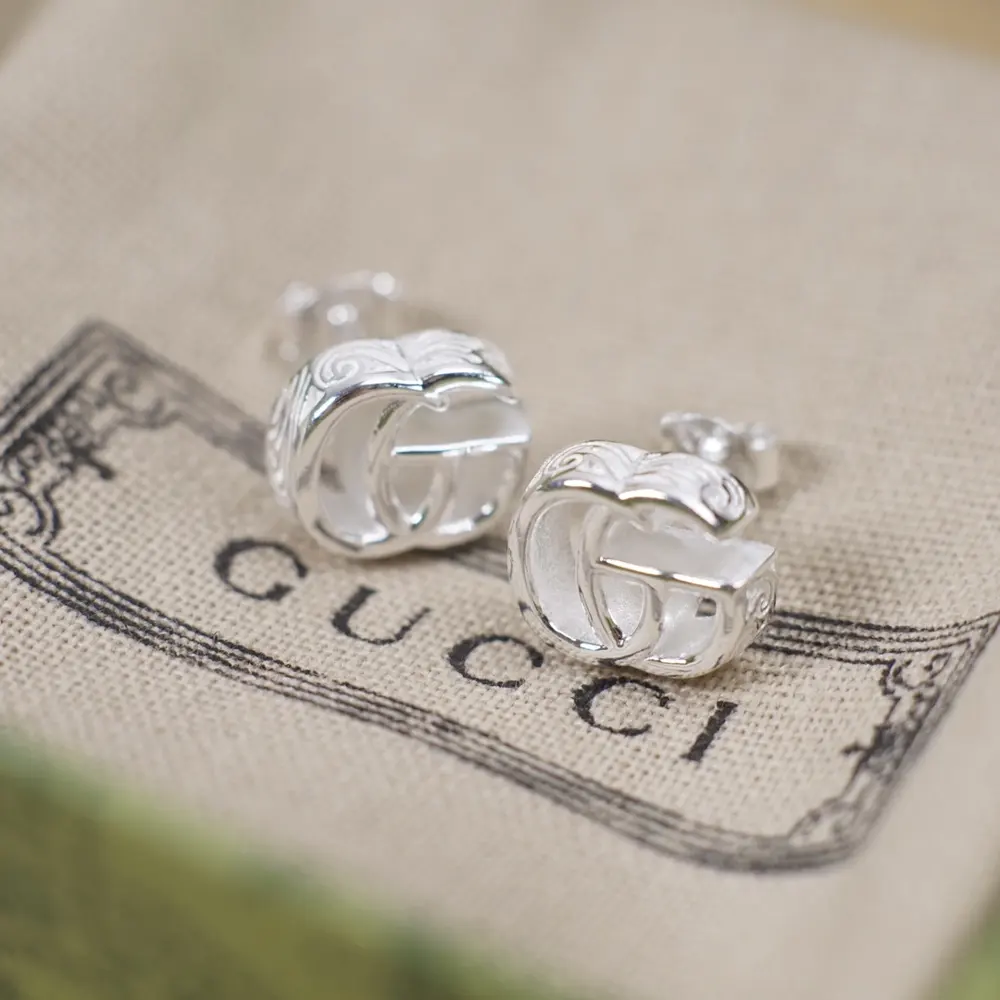 Gucci interlocking double G shiny silver open earrings