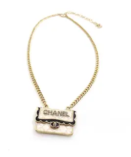 Chanel black pattern white bag necklace