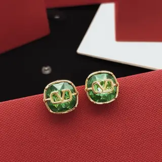 Valentino earrings with green diamonds