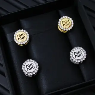 miumiu double-sided round earrings are minimalist yet stylish