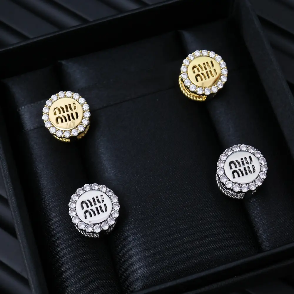 miumiu double-sided round earrings are minimalist yet stylish