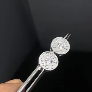 Tiffany letter round diamond earrings