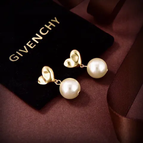 Givenchy pendant earrings. I love the infinity symbol