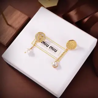 miumiu asymmetrical earrings