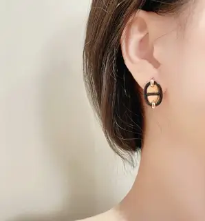 Hermès Mini Maillon orange earrings