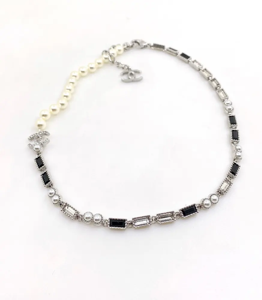 Chanel black and white diamond cc long necklace