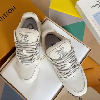 Louis Vuitton Trainer sneakers use grained cowhide leather to interpret the inspiration of
