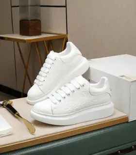 McQueen couple’s white shoes